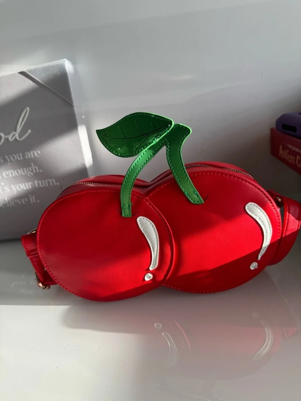 Red Cherry Crossbody Bag with Green Leaf Accent